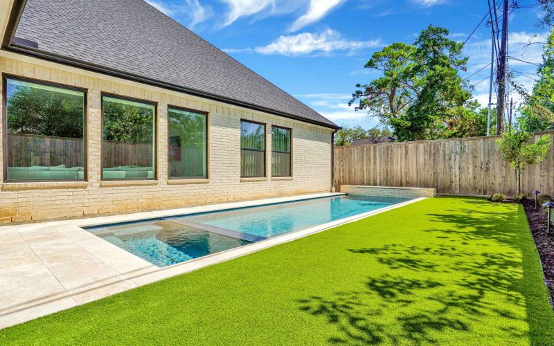 artificial grass with backyard pool - Orion Turf and Landscape